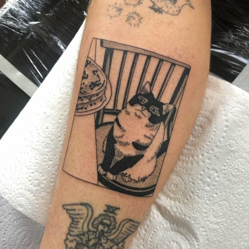 кот с блинами татуировка